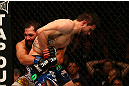 MONTREAL, QC - MARCH 16:  (L-R) Johny Hendricks attempts to take down Carlos Condit in their welterweight bout during the UFC 158 event at Bell Centre on March 16, 2013 in Montreal, Quebec, Canada.  (Photo by Jonathan Ferrey/Zuffa LLC/Zuffa LLC via Getty Images)
