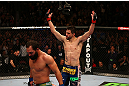 MONTREAL, QC - MARCH 16:  (R-L) Carlos Condit reacts after the conclusion of his welterweight bout against Johny Hendricks during the UFC 158 event at Bell Centre on March 16, 2013 in Montreal, Quebec, Canada.  (Photo by Jonathan Ferrey/Zuffa LLC/Zuffa LLC via Getty Images)