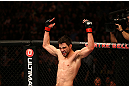 MONTREAL, QC - MARCH 16:  Carlos Condit reacts after the conclusion of his welterweight bout against Johny Hendricks during the UFC 158 event at Bell Centre on March 16, 2013 in Montreal, Quebec, Canada.  (Photo by Jonathan Ferrey/Zuffa LLC/Zuffa LLC via Getty Images)