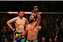MONTREAL, QC - MARCH 16:  (R-L) Johny Hendricks reacts after the conclusion of his welterweight bout against Carlos Condit during the UFC 158 event at Bell Centre on March 16, 2013 in Montreal, Quebec, Canada.  (Photo by Jonathan Ferrey/Zuffa LLC/Zuffa LLC via Getty Images)