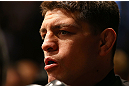 MONTREAL, QC - MARCH 16:  Nick Diaz prepares to enter the Octagon before his welterweight championship bout against Georges St-Pierre during the UFC 158 event at Bell Centre on March 16, 2013 in Montreal, Quebec, Canada.  (Photo by Jonathan Ferrey/Zuffa LLC/Zuffa LLC via Getty Images)