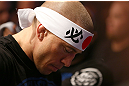 MONTREAL, QC - MARCH 16:  Georges St-Pierre prepares to enter the Octagon before his welterweight championship bout against Nick Diaz during the UFC 158 event at Bell Centre on March 16, 2013 in Montreal, Quebec, Canada.  (Photo by Jonathan Ferrey/Zuffa LLC/Zuffa LLC via Getty Images)