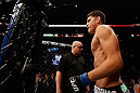 MONTREAL, QC - MARCH 16:  Nick Diaz enters in the Octagon before his welterweight championship bout against Georges St-Pierre during the UFC 158 event at Bell Centre on March 16, 2013 in Montreal, Quebec, Canada.  (Photo by Josh Hedges/Zuffa LLC/Zuffa LLC via Getty Images)