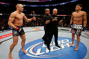MONTREAL, QC - MARCH 16:  (L-R) Opponents Georges St-Pierre and Nick Diaz face off before their welterweight championship bout during the UFC 158 event at Bell Centre on March 16, 2013 in Montreal, Quebec, Canada.  (Photo by Josh Hedges/Zuffa LLC/Zuffa LLC via Getty Images)