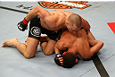 MONTREAL, QC - MARCH 16: (L-R) Georges St-Pierre lands a punch against Nick Diaz in their welterweight championship bout during the UFC 158 event at Bell Centre on March 16, 2013 in Montreal, Quebec, Canada.  (Photo by Jonathan Ferrey/Zuffa LLC/Zuffa LLC via Getty Images)