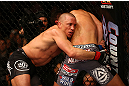 MONTREAL, QC - MARCH 16: (L-R) Georges St-Pierre grapples against Nick Diaz in their welterweight championship bout during the UFC 158 event at Bell Centre on March 16, 2013 in Montreal, Quebec, Canada.  (Photo by Jonathan Ferrey/Zuffa LLC/Zuffa LLC via Getty Images)