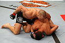 MONTREAL, QC - MARCH 16: (L-R) Georges St-Pierre grapples against Nick Diaz in their welterweight championship bout during the UFC 158 event at Bell Centre on March 16, 2013 in Montreal, Quebec, Canada.  (Photo by Jonathan Ferrey/Zuffa LLC/Zuffa LLC via Getty Images)