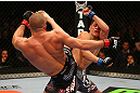 MONTREAL, QC - MARCH 16:  (R-L) Georges St-Pierre lands a kick against Nick Diaz in their welterweight championship bout during the UFC 158 event at Bell Centre on March 16, 2013 in Montreal, Quebec, Canada.  (Photo by Jonathan Ferrey/Zuffa LLC/Zuffa LLC via Getty Images)