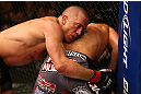 MONTREAL, QC - MARCH 16: (L-R) Georges St-Pierre grapples against Nick Diaz in their welterweight championship bout during the UFC 158 event at Bell Centre on March 16, 2013 in Montreal, Quebec, Canada.  (Photo by Jonathan Ferrey/Zuffa LLC/Zuffa LLC via Getty Images)