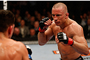 MONTREAL, QC - MARCH 16:  (R-L) Georges St-Pierre squares off with Nick Diaz in their welterweight championship bout during the UFC 158 event at Bell Centre on March 16, 2013 in Montreal, Quebec, Canada.  (Photo by Josh Hedges/Zuffa LLC/Zuffa LLC via Getty Images)