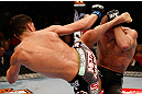 MONTREAL, QC - MARCH 16:  (L-R) Nick Diaz kicks Georges St-Pierre in their welterweight championship bout during the UFC 158 event at Bell Centre on March 16, 2013 in Montreal, Quebec, Canada.  (Photo by Josh Hedges/Zuffa LLC/Zuffa LLC via Getty Images)