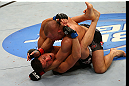 MONTREAL, QC - MARCH 16:  (R-L) Georges St-Pierre punches Nick Diaz in their welterweight championship bout during the UFC 158 event at Bell Centre on March 16, 2013 in Montreal, Quebec, Canada.  (Photo by Jonathan Ferrey/Zuffa LLC/Zuffa LLC via Getty Images)