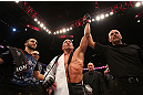 MONTREAL, QC - MARCH 16:  Georges St-Pierre reacts after winning his fight against Nick Diaz by a unanimous decision to retain his welterweight title in their welterweight championship bout during the UFC 158 event at Bell Centre on March 16, 2013 in Montreal, Quebec, Canada.  (Photo by Jonathan Ferrey/Zuffa LLC/Zuffa LLC via Getty Images)