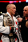 MONTREAL, QC - MARCH 16:  (L-R) Georges St-Pierre is interviewed by Joe Rogan after his victory over Nick Diaz in their welterweight championship bout during the UFC 158 event at Bell Centre on March 16, 2013 in Montreal, Quebec, Canada.  (Photo by Josh Hedges/Zuffa LLC/Zuffa LLC via Getty Images)