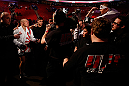 MONTREAL, QC - MARCH 16:  Georges St-Pierre greets a young fan on his way out of the arena after his victory over Nick Diaz in their welterweight championship bout during the UFC 158 event at Bell Centre on March 16, 2013 in Montreal, Quebec, Canada.  (Photo by Josh Hedges/Zuffa LLC/Zuffa LLC via Getty Images)
