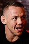 STOCKHOLM, SWEDEN - APRIL 03:  Ross Pearson of England interacts with media during an interview session at the Grand Hotel on April 3, 2013 in Stockholm, Sweden.  (Photo by Josh Hedges/Zuffa LLC/Zuffa LLC via Getty Images)