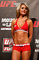 STOCKHOLM, SWEDEN - APRIL 05:  UFC Octagon Girl Carly Baker stands on stage during the UFC weigh-in at the Ericsson Globe Arena on April 5, 2013 in Stockholm, Sweden.  (Photo by Josh Hedges/Zuffa LLC/Zuffa LLC via Getty Images)