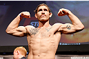 STOCKHOLM, SWEDEN - APRIL 05:  Tom Lawlor weighs in during the UFC weigh-in at the Ericsson Globe Arena on April 5, 2013 in Stockholm, Sweden.  (Photo by Josh Hedges/Zuffa LLC/Zuffa LLC via Getty Images)