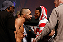STOCKHOLM, SWEDEN - APRIL 05:  (L-R) Opponents Reza Madadi and Michael Johnson face off during the UFC weigh-in at the Ericsson Globe Arena on April 5, 2013 in Stockholm, Sweden.  (Photo by Josh Hedges/Zuffa LLC/Zuffa LLC via Getty Images)