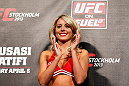 STOCKHOLM, SWEDEN - APRIL 05:  UFC Octagon Girl Carly Baker stands on stage during the UFC weigh-in at the Ericsson Globe Arena on April 5, 2013 in Stockholm, Sweden.  (Photo by Josh Hedges/Zuffa LLC/Zuffa LLC via Getty Images)