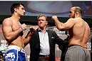 STOCKHOLM, SWEDEN - APRIL 05:  (L-R) Opponents Gegard Mousasi and Ilir Latifi face off during the UFC weigh-in at the Ericsson Globe Arena on April 5, 2013 in Stockholm, Sweden.  (Photo by Josh Hedges/Zuffa LLC/Zuffa LLC via Getty Images)