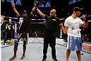 STOCKHOLM, SWEDEN - APRIL 06:  Papy Abedi (L) reacts after defeating Besam Yousef in their welterweight fight at the Ericsson Globe Arena on April 6, 2013 in Stockholm, Sweden.  (Photo by Josh Hedges/Zuffa LLC/Zuffa LLC via Getty Images)