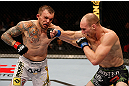 STOCKHOLM, SWEDEN - APRIL 06:  (R-L) Ryan LaFlare punches Benny Alloway in their welterweight fight at the Ericsson Globe Arena on April 6, 2013 in Stockholm, Sweden.  (Photo by Josh Hedges/Zuffa LLC/Zuffa LLC via Getty Images)