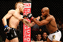 STOCKHOLM, SWEDEN - APRIL 06:  (L-R) Conor McGregor punches Marcus Brimage in their featherweight fight at the Ericsson Globe Arena on April 6, 2013 in Stockholm, Sweden.  (Photo by Josh Hedges/Zuffa LLC/Zuffa LLC via Getty Images)