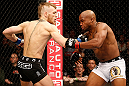 STOCKHOLM, SWEDEN - APRIL 06:  (L-R) Conor McGregor punches Marcus Brimage in their featherweight fight at the Ericsson Globe Arena on April 6, 2013 in Stockholm, Sweden.  (Photo by Josh Hedges/Zuffa LLC/Zuffa LLC via Getty Images)