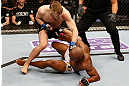 STOCKHOLM, SWEDEN - APRIL 06:  (L-R) Conor McGregor punches Marcus Brimage in their featherweight fight at the Ericsson Globe Arena on April 6, 2013 in Stockholm, Sweden.  (Photo by Josh Hedges/Zuffa LLC/Zuffa LLC via Getty Images)