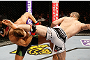 STOCKHOLM, SWEDEN - APRIL 06:  (R-L) Adlan Amagov kicks Chris Spang in their welterweight fight at the Ericsson Globe Arena on April 6, 2013 in Stockholm, Sweden.  (Photo by Josh Hedges/Zuffa LLC/Zuffa LLC via Getty Images)