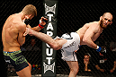 STOCKHOLM, SWEDEN - APRIL 06:  (R-L) Adlan Amagov kicks Chris Spang in their welterweight fight at the Ericsson Globe Arena on April 6, 2013 in Stockholm, Sweden.  (Photo by Josh Hedges/Zuffa LLC/Zuffa LLC via Getty Images)