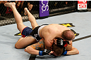 STOCKHOLM, SWEDEN - APRIL 06:  Tor Troeng (top) secures a rear choke submission against Adam Cella in their middleweight fight at the Ericsson Globe Arena on April 6, 2013 in Stockholm, Sweden.  (Photo by Josh Hedges/Zuffa LLC/Zuffa LLC via Getty Images)