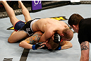 STOCKHOLM, SWEDEN - APRIL 06:  Tor Troeng (top) secures a rear choke submission against Adam Cella in their middleweight fight at the Ericsson Globe Arena on April 6, 2013 in Stockholm, Sweden.  (Photo by Josh Hedges/Zuffa LLC/Zuffa LLC via Getty Images)