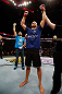 STOCKHOLM, SWEDEN - APRIL 06:  Tor Troeng reacts after his submission victory over Adam Cella in their middleweight fight at the Ericsson Globe Arena on April 6, 2013 in Stockholm, Sweden.  (Photo by Josh Hedges/Zuffa LLC/Zuffa LLC via Getty Images)