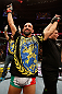 STOCKHOLM, SWEDEN - APRIL 06:  Reza Madadi reacts after his submission victory over Michael Johnson in their lightweight fight at the Ericsson Globe Arena on April 6, 2013 in Stockholm, Sweden.  (Photo by Josh Hedges/Zuffa LLC/Zuffa LLC via Getty Images)