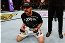 STOCKHOLM, SWEDEN - APRIL 06:  Akira Corassani reacts after defeating Robbie Peralta in their featherweight fight at the Ericsson Globe Arena on April 6, 2013 in Stockholm, Sweden.  (Photo by Josh Hedges/Zuffa LLC/Zuffa LLC via Getty Images)
