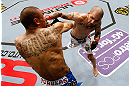 STOCKHOLM, SWEDEN - APRIL 06:  (R-L) Akira Corassani punches Robbie Peralta in their featherweight fight at the Ericsson Globe Arena on April 6, 2013 in Stockholm, Sweden.  (Photo by Josh Hedges/Zuffa LLC/Zuffa LLC via Getty Images)