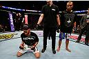 STOCKHOLM, SWEDEN - APRIL 06:  Akira Corassani (L) reacts after defeating Robbie Peralta in their featherweight fight at the Ericsson Globe Arena on April 6, 2013 in Stockholm, Sweden.  (Photo by Josh Hedges/Zuffa LLC/Zuffa LLC via Getty Images)