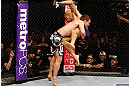 STOCKHOLM, SWEDEN - APRIL 06:  (L-R) Brad Pickett takes down Mike Easton in their bantamweight fight at the Ericsson Globe Arena on April 6, 2013 in Stockholm, Sweden.  (Photo by Josh Hedges/Zuffa LLC/Zuffa LLC via Getty Images)