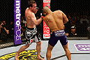 STOCKHOLM, SWEDEN - APRIL 06:  (L-R) Brad Pickett punches Mike Easton in their bantamweight fight at the Ericsson Globe Arena on April 6, 2013 in Stockholm, Sweden.  (Photo by Josh Hedges/Zuffa LLC/Zuffa LLC via Getty Images)