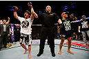 STOCKHOLM, SWEDEN - APRIL 06:  Brad Pickett (L) reacts after defeating Mike Easton in their bantamweight fight at the Ericsson Globe Arena on April 6, 2013 in Stockholm, Sweden.  (Photo by Josh Hedges/Zuffa LLC/Zuffa LLC via Getty Images)