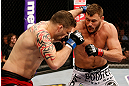 STOCKHOLM, SWEDEN - APRIL 06:  (R-L) Matt Mitrione drops Phil De Fries with a right in their heavyweight fight at the Ericsson Globe Arena on April 6, 2013 in Stockholm, Sweden.  (Photo by Josh Hedges/Zuffa LLC/Zuffa LLC via Getty Images)