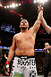 STOCKHOLM, SWEDEN - APRIL 06:  Matt Mitrione reacts after knocking out Phil De Fries in their heavyweight fight at the Ericsson Globe Arena on April 6, 2013 in Stockholm, Sweden.  (Photo by Josh Hedges/Zuffa LLC/Zuffa LLC via Getty Images)