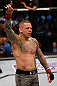 STOCKHOLM, SWEDEN - APRIL 06:  Ross Pearson reacts after defeating Ryan Couture in their lightweight fight at the Ericsson Globe Arena on April 6, 2013 in Stockholm, Sweden.  (Photo by Josh Hedges/Zuffa LLC/Zuffa LLC via Getty Images)