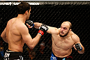 STOCKHOLM, SWEDEN - APRIL 06:  (R-L) Ilir Latifi punches Gegard Mousasi in their light heavyweight fight at the Ericsson Globe Arena on April 6, 2013 in Stockholm, Sweden.  (Photo by Josh Hedges/Zuffa LLC/Zuffa LLC via Getty Images)
