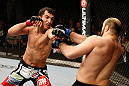 STOCKHOLM, SWEDEN - APRIL 06:  (L-R) Gegard Mousasi punches Ilir Latifi in their light heavyweight fight at the Ericsson Globe Arena on April 6, 2013 in Stockholm, Sweden.  (Photo by Josh Hedges/Zuffa LLC/Zuffa LLC via Getty Images)
