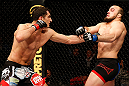 STOCKHOLM, SWEDEN - APRIL 06:  (L-R) Gegard Mousasi punches Ilir Latifi in their light heavyweight fight at the Ericsson Globe Arena on April 6, 2013 in Stockholm, Sweden.  (Photo by Josh Hedges/Zuffa LLC/Zuffa LLC via Getty Images)