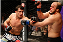 STOCKHOLM, SWEDEN - APRIL 06:  (L-R) Gegard Mousasi punches Ilir Latifi in their light heavyweight fight at the Ericsson Globe Arena on April 6, 2013 in Stockholm, Sweden.  (Photo by Josh Hedges/Zuffa LLC/Zuffa LLC via Getty Images)