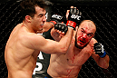 STOCKHOLM, SWEDEN - APRIL 06:  (R-L) Ilir Latifi punches Gegard Mousasi in their light heavyweight fight at the Ericsson Globe Arena on April 6, 2013 in Stockholm, Sweden.  (Photo by Josh Hedges/Zuffa LLC/Zuffa LLC via Getty Images)